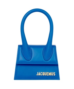 Elevate your style with the iconic Jacquemus Le Chiquito Blue Bag, a statement accessory that combines luxury with contemporary design. This coveted mini bag in stunning blue adds a pop of color to any outfit while showcasing your fashion-forward sensibilities. Perfect for day-to-night transitions, its compact size holds your essentials without compromising on style. Join the fashion elite who have made this must-have piece their signature accessory. The ultimate investment in timeless French design. Dimensions: 18x13x7.5 cm. 100% Leather Made In Italy