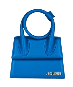 Elevate your accessory collection with the exquisite Jacquemus Le Chiquito Noeud Blue Bag. This coveted designer piece combines compact elegance with striking style, featuring the signature Jacquemus craftsmanship that fashion enthusiasts adore. The vibrant blue hue adds a bold pop of color to any outfit, while its versatile size makes it perfect for both day and evening occasions. Don't miss the opportunity to own this season's must-have statement bag that effortlessly blends luxury with practicality. Dimensions: 18x13x7.5 cm. Womens 100% Leather Made In Spain