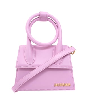 Elevate your accessory collection with the exquisite Jacquemus Le Chiquito Noeud Light Pink Bag. This coveted designer piece combines Parisian elegance with contemporary style, featuring the iconic miniature silhouette that has captivated fashion enthusiasts worldwide. The delicate light pink hue adds a touch of feminine charm to any outfit, while the distinctive knotted detail makes a sophisticated statement. Perfect for special occasions or adding luxury to everyday ensembles, this must-have bag proves that the most extraordinary style comes in small packages. Dimensions: 18x13x7.5 cm. 100% Leather Made In Spain