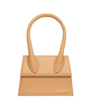 Elevate your style with the exquisite Jacquemus Le Chiquito Moyen in rich camel brown. This coveted designer bag combines compact sophistication with unmatched versatility, making it the perfect statement accessory for any occasion. The luxurious camel brown leather exudes timeless elegance while the distinctive silhouette instantly signals fashion-forward sensibility. Small in size yet big on impact, this iconic bag will transform your wardrobe and turn heads wherever you go. Dimensions: 18x13x7.5 cm. Womens 100% Leather Made In Italy