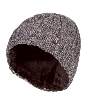 Ladies Original Turnover Hat: Stay warm and stylish with the Ladies Original Turnover Hat in Black, Rose, Purple, Blue, Fawn, Cream. Whether you're out for a walk in chilly weather or looking for a cosy accessory to complement your winter wardrobe, this thermal hat offers both comfort and warmth. Featuring a chunky knit made from soft yarn, the turnover cuff adds an extra layer of insulation to keep your ears warm. Perfect for everyday wear or outdoor adventures in cold conditions, this hat ensures you stay cosy no matter the weather. What sets this thermal hat apart is its dual-layer construction, providing optimal warmth without sacrificing style. The outer layer is knitted with Heat Holders' super-soft thermal yarn, while the inner lining boasts the unique HeatWeaver® insulation. This plush, fur-like thermal lining traps warm air close to your head, creating a thermal cavity that maximises heat retention. So, even on the coldest days, your head stays toasty and comfortable. Available in five elegant colours — Black, Rose, Purple, Blue, Fawn, and Cream — this hat is a versatile addition to your winter wardrobe, perfect for pairing with jackets, coats, or any casual outfit. Its stretchy and flexible design ensures a snug fit for most head sizes, providing a comfortable experience all day long. Extra Product Details: Material: Outer - 100% Acrylic, Lining - 100% Polyester Size: One Size Colours: Black, Rose, Purple, Blue, Fawn, Cream Features: Turnover cuff, chunky knit, HeatWeaver® insulation Care: Machine washable at 30°C, tumble dry safe, but line dry recommended Perfect for cold weather protection and all-day comfort.