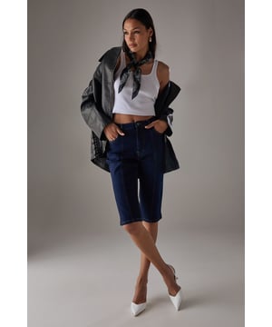 Classic knee-length denim capri with a clean, streamlined silhouette
        High-rise waistband for a flattering fit and comfortable coverage
        Traditional five-pocket styling with visible contrast stitching
        Straight-cut leg design with a neat, finished hem
        Crafted from 100% cotton for breathable comfort and durability
    
    These versatile denim capris from Warehouse strike the perfect balance between casual comfort and refined style. The high-rise design creates a sleek silhouette that pairs beautifully with both fitted and oversized tops. Style them with a crisp white crop top and an oversized leather jacket for an effortlessly cool daytime look, or dress them up with a silky blouse and pointed heels for evening drinks. The straight-cut leg offers a timeless appeal that works wonderfully for family gatherings or weekend brunches. These capris transition seamlessly between seasons - wear them with trainers and a light jumper for cooler days or with sandals and a floaty top when temperatures rise. Their durable cotton construction ensures they'll remain a wardrobe staple for years to come.
