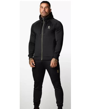 This Gym King tracksuit in black and gold is a must-have for any fashion-conscious man. The set includes a hoodie, track pants, all made from lightweight and comfortable blended fabric. The full-zip design and hooded sweatshirt make it perfect for any season and occasion, whether you're hitting the gym or running errands.