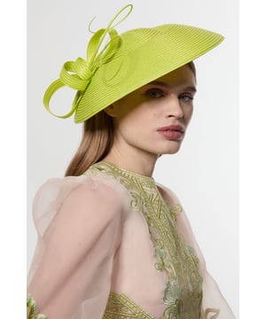 Make a striking impression at your next special occasion with this Karen Millen fascinator. The bold, architectural shape commands attention while the artful quill detailing and contrast trim create a captivating visual dynamic. Perfect for race days, garden parties or summer weddings, this headpiece adds instant sophistication to your ensemble. Style with a tailored dress or jumpsuit by our, complementing the fascinator's distinctive shape with clean lines and minimal jewellery. For maximum impact, coordinate your outfit with the fascinator's accent tones or create a deliberate contrast for a more contemporary approach. This versatile piece works with both updos and flowing locks, allowing you to customise your look while maintaining an air of refined elegance.  Statement fascinator with dramatic wide-brim silhouette Elegant quill detailing Striking contrast trim Sculptural loops and swirls Secure fit