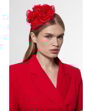 Make a captivating statement with this Karen Millen Detailed Headband Fascinator. The crafted rose embellishments create a sophisticated focal point that commands attention at any special occasion. Style with sleek, straight hair for maximum impact, or pair with an elegant updo to showcase the fascinator's intricate detailing. Perfect for race days, summer weddings or formal garden parties, this headpiece transforms even the simplest dress into a refined ensemble. The versatile design works brilliantly with both asymmetric necklines and classic silhouettes, offering endless styling possibilities for your most memorable occasions.  Striking floral design featuring two oversized rose embellishments Comfortable headband structure for secure all-day wear Delicate layered petal detailing Elegant fascinator height adds dramatic flair to any ensemble