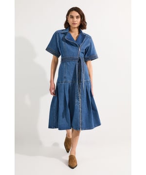 Experience elevated elegance in our skater dress, made with denim fabric, featuring a comfortable and universally flattering skater silhouette, as well as a full skirt with pleat detailing and a belt to cinch the waist. Style it with loafers or court heels for an office outfit, then with chunky heels for an evening look. Denim Pleated Hem Skater Dress High Quality Denim Fabric Flattering Fit and Flare Silhouette Belted Waistline Formal High Neckline Zip Front Fastening Box Pleated Skirt Wide, Short Sleeves