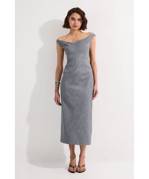 The Karen Millen Tailored Marl Strappy Pencil Maxi Dress presents a masterclass in understated daywear elegance. The off-shoulder design creates a flattering neckline that showcases your decolletage, whilst the tailored silhouette gently skims your curves for a refined look. Style this versatile piece with flat leather sandals as seen on our model for casual family gatherings or weekend brunches. For a more polished daytime ensemble, pair with block-heeled mules and a structured tote. The midi length offers a contemporary twist on the classic pencil dress, making it suitable for gallery visits or upscale lunch dates. The subtle marl texture adds depth to this seemingly simple design, whilst the back vent ensures comfort throughout the day. This dress effortlessly bridges the gap between casual and smart-casual occasions.  Elegant off-shoulder design with a distinctive sweetheart neckline Figure-enhancing tailored pencil silhouette that contours the body Sophisticated marl fabric with subtle texture for added visual interest Practical side pockets discreetly integrated into the streamlined design Back vent detail for ease of movement and refined finishing touch