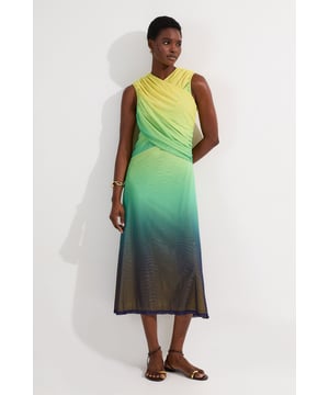 This Karen Millen maxi dress showcases artful draping across the bodice, creating a figure-enhancing silhouette that flatters your natural shape. The ombre effect adds a contemporary twist to this versatile piece, making it perfect for daytime gatherings and casual social events. Style with minimal gold jewellery, and pair with flat leather sandals for a sophisticated yet relaxed look. The midi-maxi length works for garden parties or family celebrations, while the stretchy jersey fabric ensures you remain comfortable throughout the day. For cooler evenings, layer with a lightweight denim jacket and switch to espadrille wedges to transform this dress into the perfect outfit for alfresco dining or sunset strolls along the promenade.   Striking ombre mesh design Elegant wrap bodice with sophisticated draping detail Sleeveless silhouette with V-neckline Stretchy jersey fabric Proportioned for taller frames
