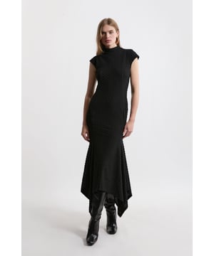 Adorned with texture among soft jersey, this dress elegantly fits the silhouette with a high neck, cap sleeves and dramatic hem cut with a maxi length. Pair with golden accessories and barely-there heels for a timeless occasion look.Cap sleevesTexturedDramatic hemBrowse this seasons bridal outfits or shop the full collection of women's wedding outfits now.