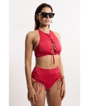 Get holiday ready in our bikini bottoms, with stitched detailing at the sides, and a full coverage design. Pairs perfectly with the matching top, sandals, and sunglasses for a holiday look perfect for lounging in the sun. Slinky Tie Detail Cheeky Bikini Bottoms Stitch Detailing at Hips Comfortable, Full Coverage Design Comfortable, High Waistline Matching Top Sold Separately Whilst appropriate for a beach destination, please note that in order to ensure enduring quality, this piece is not recommended for swimming.