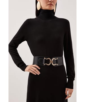 Add a stylish touch to any outfit with this premium leather waist belt. Finished with a brushed chunky gold-tone buckle for a sophisticated touch, with a stretched fit that cinches the waist.Leather beltWaist fitGold-tone buckleBrowse this seasons women's belts or discover the full range of women's accessories now.