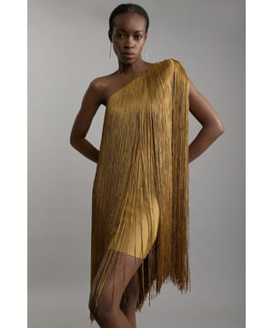 Make a statement at your next soiree with this captivating one-shoulder fringe mini dress from Karen Millen. The figure-forming bandage construction hugs your curves in all the right places, while the asymmetrical neckline adds a touch of avant-garde allure. The showstopping fringe detail cascades down the side, creating a mesmerising effect with every movement. Perfect for cocktail parties, gallery openings, or upscale dinners, this dress demands attention. Style it with strappy heels and statement earrings for a look that exudes confidence and sophistication. The versatile design allows for both elegant and edgy styling options, making it a go-to piece for various formal occasions. Let this dress be the centrepiece of your ensemble, and prepare to turn heads wherever you go.  One-shoulder design for a striking asymmetrical look Figure-hugging bandage construction accentuates curves Dramatic fringe detailing adds movement and flair Mini length for a bold, leg-lengthening effect Knitted fabric offers comfort and a sleek silhouette