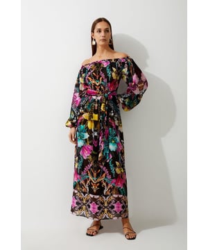 Boasting a vibrant tropical print, this maxi beach dress is crafted from a lightweight viscose composition that beckons to effortless summer styling. A Bardot neckline, wrap belt and balloon sleeves ensure a flattering fit.TropicalBardot necklineLong sleeves