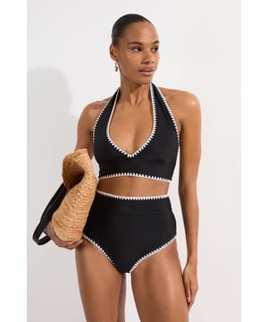 These Karen Millen high-waisted bikini bottoms high-rise design offers a timeless, sophisticated look whilst providing excellent coverage and support. Pair with the matching halter top for a coordinated ensemble that radiates poolside glamour. Perfect for lounging by the pool at exclusive resorts or enjoying coastal holidays, this swimwear piece transitions effortlessly from swimming to beachside dining when paired with a flowing kaftan and strappy sandals. This bikini set will become your go-to choice for sunny escapes and summer adventures.   High-waisted design Distinctive contrast stitch detailing Halter neck top with adjustable tie fastening Full coverage bottom  Matching piece sold separately.