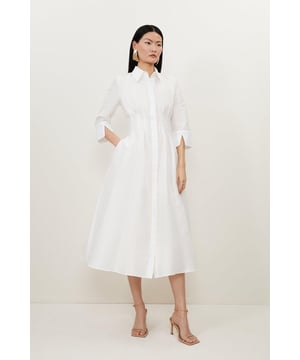 The new By Lydia: A Moment in Paris collection covers every dress code for the party season, featuring unique investment pieces that have a modern yet timeless feel.Exude understated elegance in this darted waist midi dress. Designed with crisp taffeta fabric, this piece is smooth to the touch. Elevate this dress with heels and accessories for a special occasion, or pair with boots for an everyday look.Taffeta fabricDarted waistThree quarter sleevesMidi hemlineCollared neckline