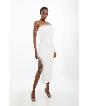 Master occasion dressing in our midi dress, featuring floating feathers adorning the bodice and leg split, and a dramatic, thigh high leg split. Style it with strappy heels for a statement occasion look that is certain to turn heads. Figure Form Bandage Feather Detail Bandeau Knit Midi Dress High Quality Knit Fabric Flattering Straight Neckline Statement, Feather Trims and Bodice Statement Thigh High Leg Split Midi Length Zip Back Fastening