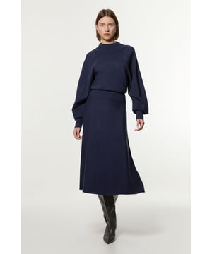 Introducing By Lydia: An Elegant Invitation - a new season collection with Lydia Millen, infused with sophistication and flair for the party season. Go seamlessly from day to night in our midi dress, made in soft knit fabric, featuring long sleeves, and a comfortable, relaxed fit that cinches at the waist to flaunt the figure. Style it simply with heeled boots or pointed toe heels for a look that will take you from date nights to upcoming parties and events. Lydia Millen Wool Look Rounded Sleeve Knit Midaxi Dress Seamless Knit Fabric Flattering Relaxed Silhouette Cinched Waistline Straight Hanging Skirt High Neckline
