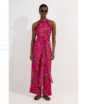 This Karen Millen jumpsuit combines effortless style with day-to-evening versatility. The flattering halterneck design showcases shoulders beautifully, while the wide-leg cut creates a graceful silhouette that moves with you. Style with flat leather sandals and oversized sunglasses for a sophisticated daytime look at garden parties or family gatherings. For evening casual events, swap for block-heeled mules and add statement gold bangles to complement the vibrant print. The self-tie belt allows you to customise the fit to your preference, accentuating your waistline. Layer with a lightweight denim jacket for cooler evenings or transitional seasons.  Elegant halter neck design with delicate lace trim Striking floral print pattern Wide leg silhouette Self-tie belt to define and flatter the waistline Practical side pockets