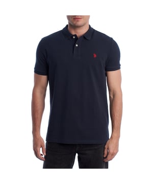Inspired by the brand's sporting heritage, this US Polo Assn. polo offers a perfect blend of tradition and modernity. Designed for the man who values authenticity, its impeccable cut and embroidered details make it a contemporary wardrobe staple.

 Details:
 - Classic polo-style collar with two-button placket.
 - Short sleeves.
 - Piping detail on the inside of the neck.
 - US Polo Assn. logo embroidered on the chest.
 - Regular cut that guarantees comfort and freedom of movement.
 - High quality breathable piqué fabric.

 At US Polo Assn., every garment tells a story of authenticity, tradition, and sporty style. This men's polo shirt isn't just a staple: it represents the official heritage of the sport of polo and reflects our passion for quality, design, and casual elegance. Dress with identity, dress with history.
 Composition: 100% Cotton
 Care:
Machine wash cold (max. 30°C).
 Do not use bleach.
 Iron at low temperature if necessary.
 Air dry, avoid dryer.
