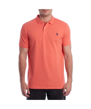 Inspired by the brand's sporting heritage, this US Polo Assn. polo offers a perfect blend of tradition and modernity. Designed for the man who values authenticity, its impeccable cut and embroidered details make it a contemporary wardrobe staple.

 Details:
 - Classic polo-style collar with two-button placket.
 - Short sleeves.
 - Piping detail on the inside of the neck.
 - US Polo Assn. logo embroidered on the chest.
 - Regular cut that guarantees comfort and freedom of movement.
 - High quality breathable piqué fabric.

 At US Polo Assn., every garment tells a story of authenticity, tradition, and sporty style. This men's polo shirt isn't just a staple: it represents the official heritage of the sport of polo and reflects our passion for quality, design, and casual elegance. Dress with identity, dress with history.
 Composition: 100% Cotton
 Care:
Machine wash cold (max. 30°C).
 Do not use bleach.
 Iron at low temperature if necessary.
 Air dry, avoid dryer.