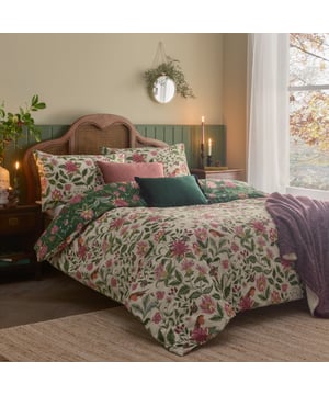 Transform your bedroom into a serene countryside retreat with the Beatrice Reversible Floral Duvet Cover Set. Inspired by archival floral prints, Beatrice is a timeless burst of wintry berries, blooms, and foliage, reimagined in vivid jewel tones. A cheerful little robin perches among festive seasonal sprigs, adding a joyful touch to the scene. Crafted from a luxuriously soft cotton blend, it ensures comfort and durability, while the contrasting reverse gives you two stylish looks in one. Designed with an easy button closure and simple care instructions, it’s a perfect blend of beauty, ease, and charm for lovers of modern country style.