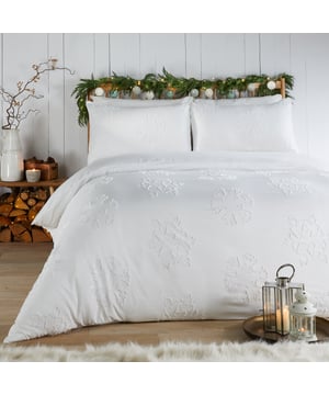 Transform your bedroom into a cosy sanctuary with the Snow Crystal Tufted Ultra Soft Touch Duvet Cover Set. Designed with delicately tufted snowflakes on an irresistibly soft fabric, this set is perfect for adding a touch of seasonal charm to your space. The luxurious feel invites you to unwind and sink into comfort, while the easy-care design ensures your bedding stays effortlessly fresh. Ideal for the colder months, it combines style and practicality, offering a look that’s as beautiful as it is comfortable. Perfect for those who value bedding that feels as good as it looks.