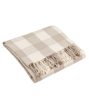 Transform your living space with the Chesil Check Tasselled 100% Cotton Throw, a versatile addition that embodies both style and functionality. Crafted from premium cotton, this throw promises durability and comfort, offering multiple uses. Its classic check pattern in muted shades, coupled with a charming tassel trim, exudes timeless style while fostering a sense of well-being through natural materials. Enhance your home with a piece that embodies quality. Size: 130 cm x 170 cm