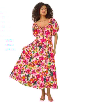 Dusk Floral Pleated Puff Dress from Roman. Feel chic and feminine in this floral puff dress, perfect for the Spring/Summer season. Featuring a flattering tie detail at the bust and cute short puff sleeves, this dress is designed in a stylish fit. Made from a comfortable woven fabric, it's a pull-on style for effortless wearing. Pair with sandals and sunglasses for a delightful outfit that's ideal for sunny days out!