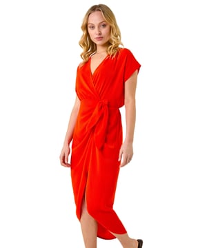 Dusk Tie Detail Wrap Dress from Roman. Flatter your figure this season with our stylish Dusk wrap dress! Cut from a floaty woven fabric, this Summer dress embodies warm weather glamour with a flattering v-neckline, wrap bodice and playful short sleeves. Plain in colour for endless outfit opportunities with striking side splits, this glamorous day dress is sure to elevate your casual collection. Wear with wedges and you’re picnic-ready!