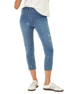 Embellished Cropped Stretch Jeggings from Roman. Get ready to sparkle in these cropped jeggings this Spring Summer! Featuring functional belt loops and a flattering shape, these denim jeggings are adorned with beautiful embellished details. Cut from a soft, stretch cotton fabric, they finish at a stylish cropped length. Pair with a white blouse and wedge sandals for a trendy outfit that effortlessly transitions from day to night.