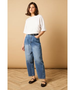 Trendy barrel leg silhouette for a modern twist on classic denim
        High-rise waist for a flattering and comfortable fit
        Tapered design from thigh to ankle for a stylish shape
        Traditional five-pocket styling for practicality
        Button and zip fly fastening for secure wear
    
    Embrace the latest denim trend with these chic barrel leg jeans from Oasis. The high-rise waist and tapered silhouette create a flattering shape that's perfect for various body types. Style these versatile jeans for a range of casual occasions - pair them with a cropped white tee and denim jacket for a double denim look that's effortlessly cool. For a more polished ensemble, team with a silky blouse and metallic flats. These jeans are ideal for family gatherings, weekend brunches, or casual Fridays at the office. The relaxed fit through the thigh transitioning to a slightly narrower ankle offers both comfort and style, making these jeans a wardrobe staple that you'll reach for time and time again.