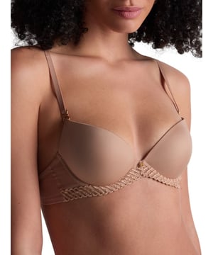 Aubade Sheer Emotion Moulded Push-Up Bra. Underwired plunge bra bra with lightweight moulded cleavage enhancing cups, shimmering fabric, a comfortable semi sheer mesh back, and intricate embroidery. Matching briefs available. This item is recommended for hand wash only.