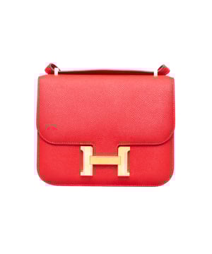 VINTAGE, RRP AS NEW
Carry elegance and functionality with the stunning Hermès Constance III Mini Bag. Its red epsom leather exterior is accented with golden hardware inserts, while the convertible shoulder strap allows for versatile wearing options. The iconic "H" becomes a chic and functional clasp opening. Inside, the red leather lining and multiple compartments keep your belongings organized.
Inclusion: dust bag. Measurments:  width: 101 mm length: 457 mm height: 381 mm