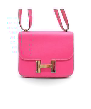 VINTAGE, RRP AS NEW
The Hermès Constance 18 Mini in Fuchsia Epsom Leather is a luxurious and vibrant accessory, crafted from durable scratch-resistant Epsom leather. The bright fuchsia pink color adds a striking pop, while the polished silver hardware provides a refined touch. This compact yet elegant bag is perfect for any occasion.
Remarks: The bag shows no obvious signs of wear, apart from a few subtle scratches on the hardware. Measurments:  width: 203 mm length: 457 mm height: 355 mm