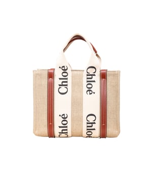 VINTAGE, RRP AS NEW
Effortlessly chic and environmentally conscious, the small Chloé Woody Tote Bag is crafted from lower-impact linen canvas and shiny brown calfskin strips. This compact bag features a roomy unlined interior with a practical leather shoulder strap and can be carried by top handles or as a crossbody on the shoulder.
Inclusion: dust bag, shoulder strap, authenticity card.
Assured Product Authenticity: This product is supplied by a renowned and trusted partner.
With this purchase, you are preserving iconic craftsmanship, celebrating heritage, and embracing the beauty of conscious shopping.Measurments:  width: 80 mm length: 260 mm height: 200 mm handle drop: 100 mm