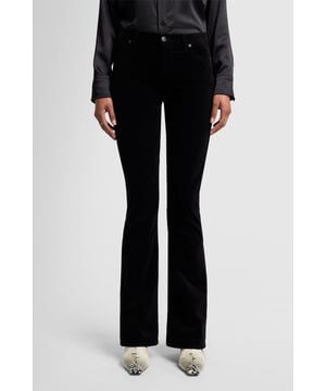 Dames  Onze HW Ali fit heeft een jaren 70 sensibiliteit, dankzij de hoge taille en uitlopende pijpen. Uitgevoerd in luxueus zwart fluweel is dit model perfect voor een avondstyling - denk aan een satijnen overhemd en laarzen met slangenprint.