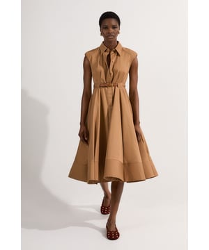 Tailored cotton midi dress with a classic collared neckline Sleeveless design for a fresh, summery look Fitted bodice with a flared skirt for a flattering silhouette Matching belt to cinch in the waist and add definition Button-down front for easy wear and versatile styling options  This Karen Millen dress radiates timeless elegance with a modern twist. Perfect for a variety of daytime occasions, it's a versatile piece that can be dressed up or down. For a casual family gathering, pair it with flat sandals and a woven tote bag for a relaxed yet put-together look. When heading to a lunch date with friends, style it with block-heeled mules and delicate gold jewellery to add a touch of sophistication. The cotton fabric ensures breathability, making it ideal for warm weather events. Layer with a lightweight cardigan for cooler days or evenings. The midi length and full skirt create a graceful movement as you walk, while the belted waist allows you to customise the fit to your liking. This dress is a wardrobe staple that promises to be a go-to for countless daytime events.