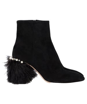 VINTAGE, RRP AS NEW
 The Miu Miu Feather Pearl-Embellished Ankle Boots in Black Suede are a captivating mix of drama and luxury, adorned with delicate pearls and soft feathers for a high-fashion finish. Crafted from plush suede, these boots offer a striking silhouette that effortlessly turns heads. Pair them with a sleek mini dress or tailored shorts to showcase their unique detailing and add a touch of avant-garde elegance to your look.

Miu Miu Feather Pear-Embellished Ankle Boots in Black Suede

Condition: Very good
Signs of wear: Minor markings, Lightly used but very well maintained. Minor mark at soles & creasing, light scuffing at the soles and heels.
Packaging: Dust bag
Color: Black
Material: Suede | suede
Size: IT | 39
Measurements: Heel height: 80; Insole length: 280
SKU: NAPPUGBSH489770W