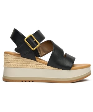 Sandalias Blowfish Solly negras para mujer, fabricadas con sintético y suela de goma. Presentan la marca Blowfish, suela gruesa, hebilla ajustable y son veganas.