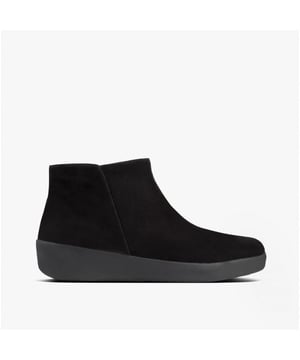 These ankle boots feature a suede upper, textile lining, and slip-resistant rubber sole with a round toe and flat heel, offering comfort for casual wear