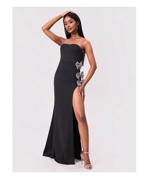 Detalles de trim con lazo  
  Abertura elegante  
  Transparente: Opaco  
  Elasticidad: Elasticidad moderada  
  Cuerpo: No forrado  
  Composición del material: 95% poliéster 5% elastano  
  Instrucciones de cuidado: Lavar a máquina con agua fría, secar en secadora a baja temperatura  
  Importado