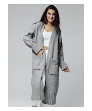 Gepokt Open Voor Dropped Shoulder Cardigan  
Materiaal: 100% polyester  
Gemiddelde stretch  
Verzorgingsinstructies: Machinewas koud, drogen op lage temperatuur  
Invoer  
Eén maat past de meeste   
Afmetingen: Lengte bovenkant: 108 cm Borst: 118 cm Mouwlengte: 48 cm