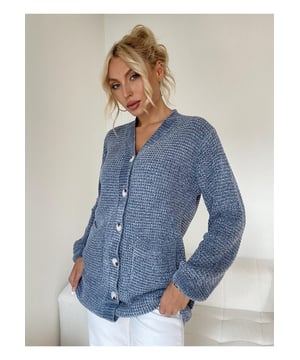 Cardigan de botón con cuello en V y bolsillos para mujer  
Frente abotonado  
Bolsillos convenientes  
Elasticidad moderada  
Composición del material: 50% viscosa, 30% poliéster, 20% poliamida  
Instrucciones de cuidado: Lavar a máquina en frío, secar a baja temperatura  
Importado  
Talla única: Largo del top  
30.7 pulgadas Pecho  
41.7 pulgadas Hombro  
17.3 pulgadas Largo de la manga  
22.8 pulgadas  