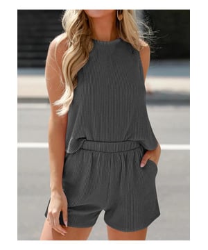 Round Neck Sleeveless Top and Shorts Set
  Features drawstring waist and ruffled detailing
  Two
  piece set includes sleeveless top and matching shorts
  Slightly stretchy fabric for comfort
  Material composition: 97% polyester 3% elastane
  Care instructions: Machine wash cold tumble dry low
  Imported