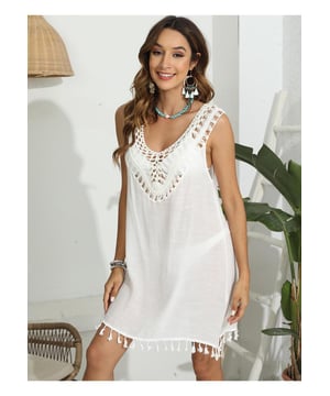 Producto: Top con escote en forma de pico y tirantes anchos con borlas  
Características: Borlas con corte  
Transparente: Semitransparente  
Elasticidad: Sin elasticidad  
Composición del material: 100% poliéster  
Instrucciones de cuidado: Lavable a máquina en frío, secar a baja temperatura  
Importado  
Medidas: Longitud del top: 31.5 pulgadas, Busto: 41.7 pulgadas