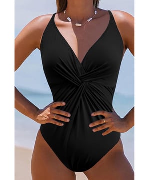 Ontwerp met ruches
  Niet
  verwijderbare vulling
  Geen beugel
  Zeer rekbare stof
  Materiaalsamenstelling: 80% nylon 20% spandex
  Onderhoudsinstructies: Machinewas koud droogtrommel laag
  Geimporteerd