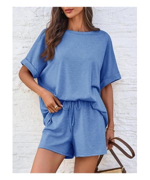 Basic style
  Two
  piece set
  No stretch
  95% polyester 5% spandex
  Machine wash cold tumble dry low
  Imported
  Size S: Bust 40.9 inches Top Length 24.8 inches Bottom Length 13.8 inches Waist 25.2 inches Hip 41.7 inches
  Size M: Bust 42.5 inches Top Length 25.2 inches Bottom Length 14.2 inches Waist 26.8 inches Hip 43.3 inches
  Size L: Bust 44.9 inches Top Length 25.6 inches Bottom Length 14.6 inches Waist 29.1 inches Hip 45.7 inches
  Size XL: Bust 47.2 inches Top Length 26 inches Bottom Length 15 inches Waist 31.5 inches Hip 48 inches
Material: The material appears to be a soft lightweight knit fabric possibly a blend of cotton and polyester.  The exact composition is .