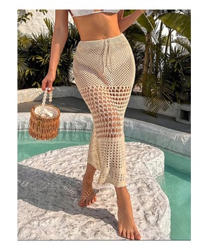 Producto: Falda con Cubierta Hueca Atada
Características: Abierto tejido atado
Elasticidad: Ligeramente elástico
Composición del material: 100% poliéster
Instrucciones de cuidado: Lavar a máquina en frío Secar a baja temperatura
Importado