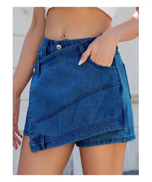 Asymmetrical design
  No stretch
  95% rayon 5% polyester
  Machine wash cold
  Tumble dry low
  Imported
  Available in sizes S to 2XL
  Size S: Waist 27.6 inches Hip 40.2 inches Bottom Length 13.8 inches
  Size M: Waist 29.5 inches Hip 42.1 inches Bottom Length 14.2 inches
  Size L: Waist 31.5 inches Hip 44.1 inches Bottom Length 14.6 inches
  Size XL: Waist 34.6 inches Hip 47.2 inches Bottom Length 15 inches
  Size 2XL: Waist 37.8 inches Hip 50.4 inches Bottom Length 15.4 inches
Material: Denim