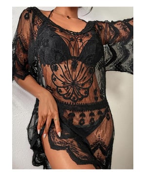 Estilo básico  
Diseño transparente  
Sin elasticidad  
Material 100% poliéster  
Lavable a máquina en frío  
Secar a baja temperatura  
Importado  
Longitud de la blusa: 31.5 pulgadas  
Busto: 39.4 pulgadas  
